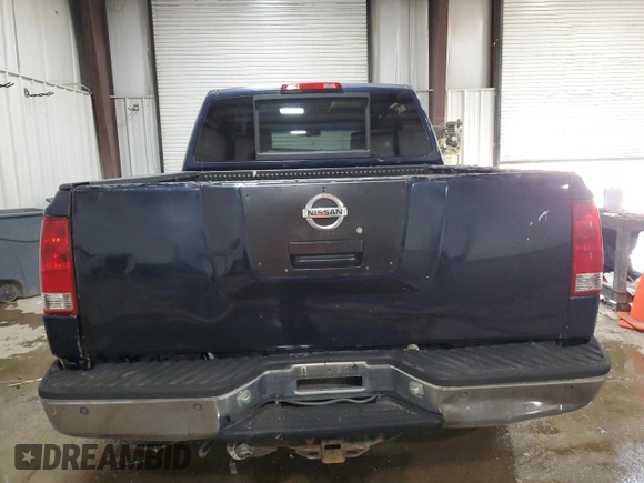 2007 Nissan Titan XE z VIN 1N6BA07A87N220937, wystawiony jako Copart lot #60336605 z przebiegiem 219 286 mil mil oraz Czysty tytuł • Clean title. Historia ofert i sprzedaży dostępna na DreamBid. Obrazek 6.