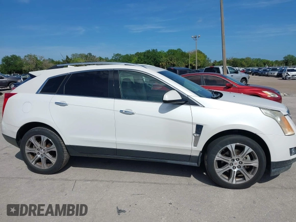 2012 Cadillac SRX Premium Collection with VIN 3GYFNCE30CS652687, listed as a IAAI auction lot 41964386 with 131,722 mi miles. Bid and sale history available at carsss.com. Image 13.