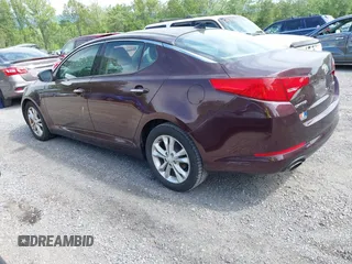 2013 Kia Optima EX with VIN 5XXGN4A70DG147510, listed as a IAAI auction lot 42211671 with 138,947 mi miles and . Bid and sale history available at carsss.com. Image 3.