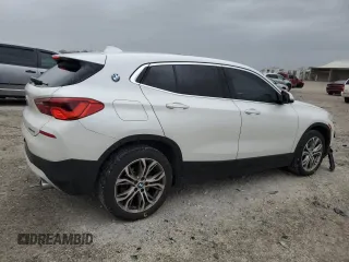 2019 BMW X2 sDrive28i with VIN WBXYJ3C58K5N39693, listed as a Copart auction lot 86760414 with 77,668 mi miles and Salvage Title. Bid and sale history available at carsss.com. Image 3.