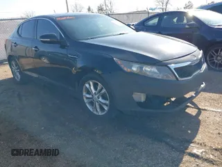 2013 Kia Optima LX with VIN 5XXGM4A72DG192452, listed as a IAAI auction lot 41799889 with 207,290 mi miles. Bid and sale history available at carsss.com. Image 1.
