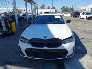 2024 BMW 3 Series 330e with VIN 3MW39FF05R8D89036, listed as a IAAI auction lot 41636274 with 17,513 mi miles and . Bid and sale history available at carsss.com. Image 12.