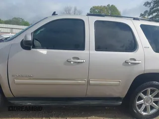 2009 GMC Yukon SLT w/4SB with VIN 1GKFC33029R273453, listed as a IAAI auction lot 41843277 with 194,684 mi miles. Bid and sale history available at carsss.com. Image 14.