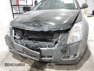 2013 Cadillac CTS Premium z VIN 1G6DS5E34D0103328, wystawiony jako IAAI lot #41501406 z przebiegiem 157 633 mil mil oraz . Historia ofert i sprzedaży dostępna na DreamBid. Obrazek 6.
