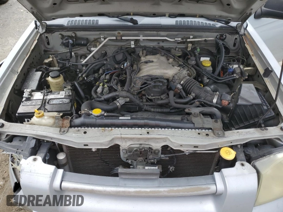 2003 Nissan Frontier SE z VIN 1N6ED29X33C413665, wystawiony jako Copart lot #43689245 z przebiegiem 188 345 mil mil oraz Szkoda całkowita • Salvage title. Historia ofert i sprzedaży dostępna na DreamBid. Obrazek 11.