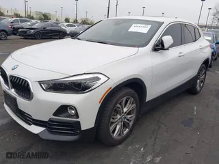 2020 BMW X2 sDrive28i with VIN WBXYH9C02L5P59822, listed as a IAAI auction lot 41893205 with 1 mi miles. Bid and sale history available at carsss.com. Image 2.