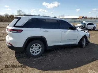 2023 Jeep Grand Cherokee Laredo z VIN 1C4RJHAGXPC619230, wystawiony jako Copart lot #52412175 z przebiegiem 36 255 mil mil oraz Szkoda całkowita • Salvage title. Historia ofert i sprzedaży dostępna na DreamBid. Obrazek 3.