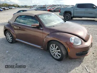 2016 Volkswagen Beetle S with VIN 3VW517AT4GM823250, listed as a Copart auction lot 51788835 with 82,240 mi miles and Salvage Title. Bid and sale history available at DreamBid. Image 4.