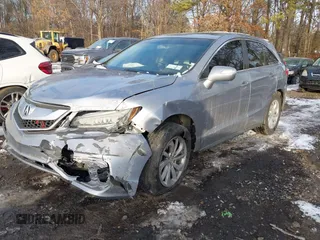 2016 Acura RDX with VIN 5J8TB4H39GL002899, listed as a IAAI auction lot 41384985 with 146,979 mi miles. Bid and sale history available at carsss.com. Image 6.