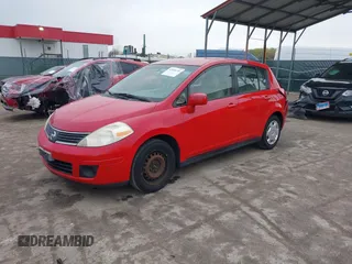 2007 Nissan Versa 1.8 S with VIN 3N1BC13EX7L364889, listed as a IAAI auction lot 42008734 with 147,613 mi miles. Bid and sale history available at carsss.com. Image 2.