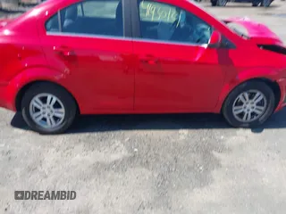2013 Chevrolet Sonic LT with VIN 1G1JC5SH4D4169926, listed as a IAAI auction lot 41930121 with 105,351 mi miles and . Bid and sale history available at DreamBid. Image 13.