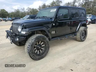 2019 Jeep Wrangler Unlimited Sahara with VIN 1C4HJXEN9KW535891, listed as a Copart auction lot 48426545 with 104,258 mi miles and Non Repairable. Bid and sale history available at carsss.com. Image 1.