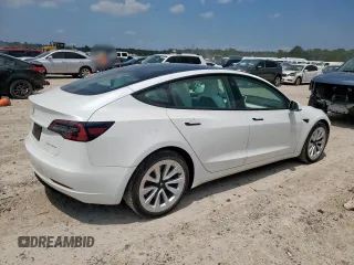 2021 Tesla Model 3 Long Range z VIN 5YJ3E1EB1MF049049, wystawiony jako Copart lot #58432885 z przebiegiem 22 185 mil mil oraz Szkoda całkowita • Salvage title. Historia ofert i sprzedaży dostępna na DreamBid. Obrazek 3.