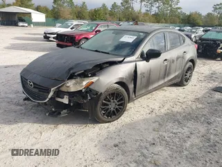 2015 Mazda 3 i SV with VIN JM1BM1T79F1246799, listed as a IAAI auction lot 41785860 with 109,760 mi miles. Bid and sale history available at carsss.com. Image 2.
