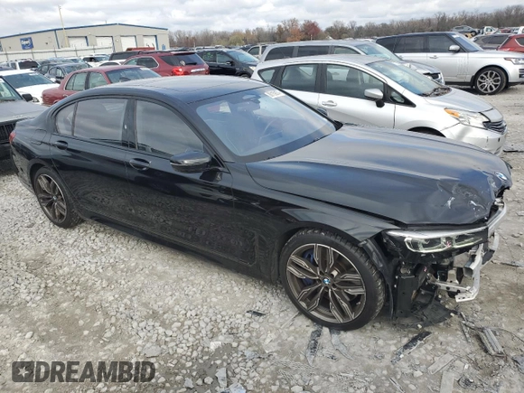 2022 BMW 7 Series with VIN WBA7U6C06NCK59421, listed as a Copart auction lot 80159874 with 24,033 mi miles and Salvage title. Bid and sale history available at DreamBid. Image 4.