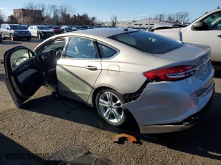 2018 Ford Fusion Hybrid S with VIN 3FA6P0UUXJR122858, listed as a Copart auction lot 85801834 with 0 mi miles and Salvage Title. Bid and sale history available at carsss.com. Image 2.