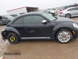 2013 Volkswagen Beetle 2.5L w/Sun/Sound/Nav with VIN 3VWJX7AT1DM686146, listed as a IAAI auction lot 41444277 with 92,964 mi miles and . Bid and sale history available at DreamBid. Image 13.