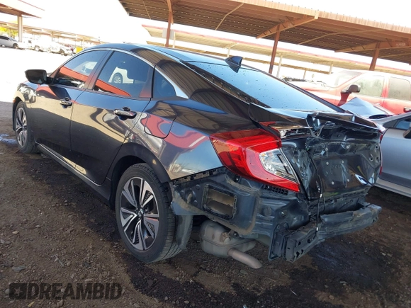 2018 Honda Civic EX-L z VIN JHMFC1F8XJX033602, wystawiony jako IAAI lot #42161015 z przebiegiem 99 597 mil mil oraz . Historia ofert i sprzedaży dostępna na DreamBid. Obrazek 3.