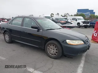 2002 Honda Accord SE z VIN 1HGCG66822A165832, wystawiony jako IAAI lot #42438400 z przebiegiem 252 564 mil mil oraz . Historia ofert i sprzedaży dostępna na DreamBid. Obrazek 1.
