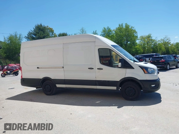 2020 Ford Transit Cargo with VIN 1FTBW3X86LKA66775, listed as a IAAI auction lot 42241856 with 66,985 mi miles and . Bid and sale history available at DreamBid. Image 13.