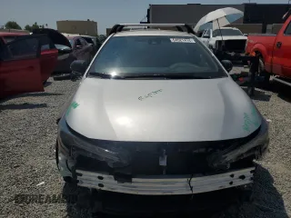 2022 Toyota Corolla Hatchback SE with VIN JTND4MBE2N3180993, listed as a Copart auction lot 64521414 with 15,393 mi miles and Salvage Title. Bid and sale history available at carsss.com. Image 5.