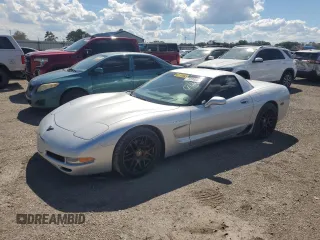 2002 Chevrolet Corvette Z06 with VIN 1G1YY12S025125563, listed as a Copart auction lot 73230004 with 93,851 mi miles and Salvage Title. Bid and sale history available at carsss.com. Image 1.