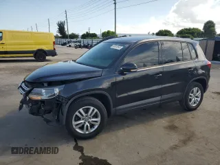 2014 Volkswagen Tiguan SE with VIN WVGAV3AX7EW530291, listed as a Copart auction lot 58915545 with 173,710 mi miles and Salvage title. Bid and sale history available at DreamBid. Image 1.