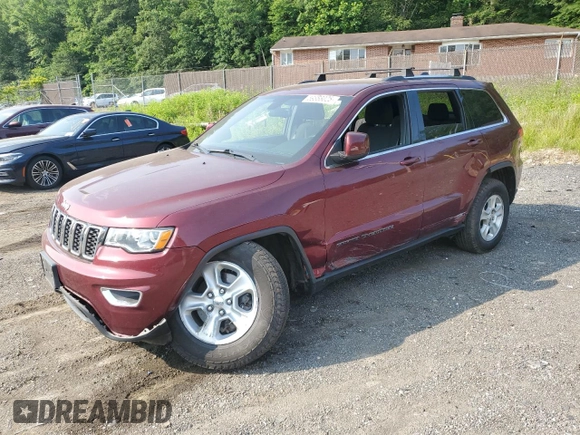2017 Jeep Grand Cherokee Laredo with VIN 1C4RJFAG8HC940849, listed as a Copart auction lot 59868025 with 111,743 mi miles and Salvage title. Bid and sale history available at DreamBid. Image 1.