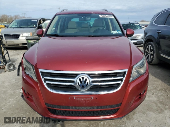 2011 Volkswagen Tiguan SE with VIN WVGBV7AX7BW001124, listed as a Copart auction lot 53044005 with 150,072 mi miles and Salvage Title. Bid and sale history available at DreamBid. Image 5.