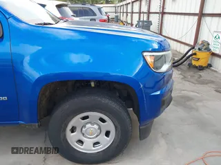 2018 Chevrolet Colorado 2WD Work Truck z VIN 1GCHSBEA8J1300911, wystawiony jako IAAI lot #42543557 z przebiegiem 73 896 mil mil oraz . Historia ofert i sprzedaży dostępna na DreamBid. Obrazek 20.