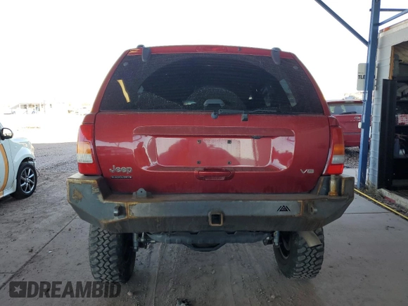 2002 Jeep Grand Cherokee Limited с VIN 1J4GW58N22C126821, выставлен на аукционе Copart как лот 46304015 с пробегом 157 932 миль миль и Списание • Salvage title. История ставок и продаж доступна на DreamBid. Изображение 6.