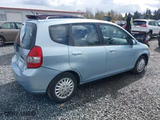 2007 Honda Fit with VIN JHMGD38477S040942, listed as a IAAI auction lot 41936189 with 136,127 mi miles. Bid and sale history available at carsss.com. Image 4.