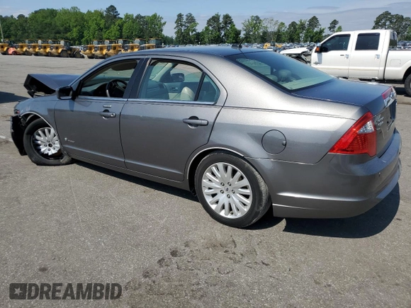 2010 Ford Fusion Hybrid z VIN 3FADP0L33AR267806, wystawiony jako Copart lot #55952815 z przebiegiem 146 912 mil mil oraz Szkoda całkowita • Salvage title. Historia ofert i sprzedaży dostępna na DreamBid. Obrazek 2.