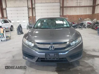 2016 Honda Civic Sedan LX with VIN 19XFC2F58GE214672, listed as a IAAI auction lot 42067792 with 73,929 mi miles. Bid and sale history available at carsss.com. Image 11.