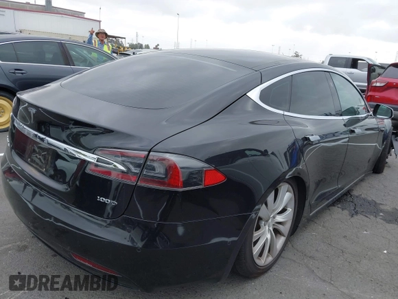 2017 Tesla Model S 100D with VIN 5YJSA1E26HF197176, listed as a IAAI auction lot 42565791 with 120,287 mi miles and . Bid and sale history available at DreamBid. Image 4.