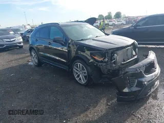 2019 Cadillac XT4 AWD Sport with VIN 1GYFZFR47KF159925, listed as a IAAI auction lot 42041369 with 90,813 mi miles and . Bid and sale history available at DreamBid. Image 1.