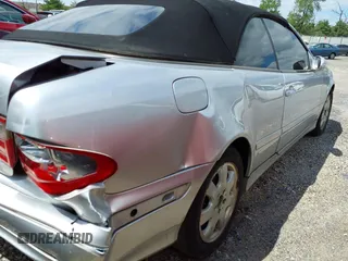2003 Mercedes-Benz CLK 320 z VIN WDBLK65G23T142769, wystawiony jako IAAI lot #42155649 z przebiegiem 106 644 mil mil oraz . Historia ofert i sprzedaży dostępna na DreamBid. Obrazek 13.