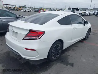 2015 Honda Civic Coupe LX with VIN 2HGFG3B55FH517865, listed as a IAAI auction lot 42056572 with 147,074 mi miles. Bid and sale history available at carsss.com. Image 4.