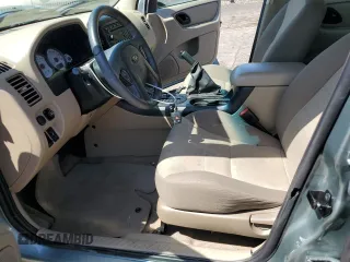 2006 Ford Escape XLS z VIN 1FMYU02Z36KB10195, wystawiony jako Copart lot #53108415 z przebiegiem Nie podano mil oraz Szkoda całkowita • Salvage title. Historia ofert i sprzedaży dostępna na DreamBid. Obrazek 7.