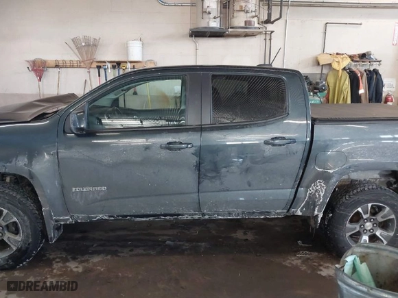 2019 Chevrolet Colorado 4WD Z71 with VIN 1GCGTDEN9K1299292, listed as a IAAI auction lot 41626944 with 84,949 mi miles. Bid and sale history available at carsss.com. Image 14.
