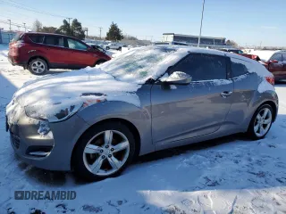 2014 Hyundai Veloster z VIN KMHTC6ADXEU215017, wystawiony jako Copart lot #46307205 z przebiegiem 143 912 mil mil oraz Czysty tytuł • Clean title. Historia ofert i sprzedaży dostępna na DreamBid. Obrazek 1.