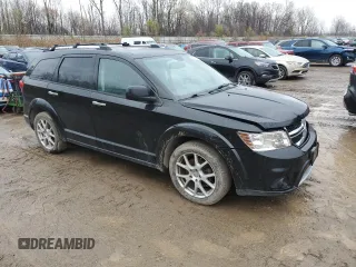 2014 Dodge Journey R/T with VIN 3C4PDDFG4ET117900, listed as a Copart auction lot 80911244 with 111,773 mi miles and Clean title. Bid and sale history available at DreamBid. Image 4.