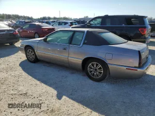 1996 Cadillac Eldorado z VIN 1G6EL12Y6TU613813, wystawiony jako Copart lot #78274114 z przebiegiem Nie podano mil oraz Szkoda całkowita • Salvage title. Historia ofert i sprzedaży dostępna na DreamBid. Obrazek 2.