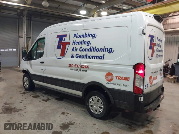 2021 Ford Transit Cargo with VIN 1FTBR1C82MKA29712, listed as a IAAI auction lot 41463781 with 83,961 mi miles and . Bid and sale history available at DreamBid. Image 3.