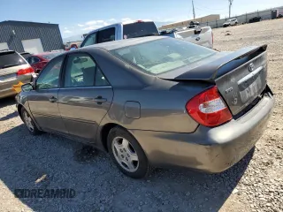 2003 Toyota Camry LE z VIN 4T1BF32K93U566965, wystawiony jako Copart lot #71979144 z przebiegiem 267 228 mil mil oraz Szkoda całkowita • Salvage title. Historia ofert i sprzedaży dostępna na DreamBid. Obrazek 2.