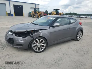 2013 Hyundai Veloster w/Red Int z VIN KMHTC6AD2DU132230, wystawiony jako Copart lot #60237225 z przebiegiem 111 218 mil mil oraz Szkoda całkowita • Salvage title. Historia ofert i sprzedaży dostępna na DreamBid. Obrazek 1.