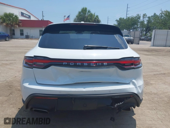 2023 Porsche Macan with VIN WP1AA2A55PLB11111, listed as a IAAI auction lot 42209465 with 25,612 mi miles and . Bid and sale history available at DreamBid. Image 16.
