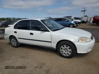 2000 Honda Civic LX with VIN 2HGEJ6677YH546801, listed as a Copart auction lot 55528945 with 224,812 mi miles and Salvage Title. Bid and sale history available at DreamBid. Image 4.