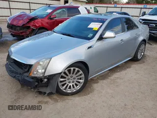 2012 Cadillac CTS Premium with VIN 1G6DP5E34C0124972, listed as a IAAI auction lot 41245338 with 111,140 mi miles and . Bid and sale history available at DreamBid. Image 2.