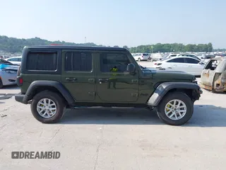 2023 Jeep Wrangler Willys with VIN 1C4HJXDG7PW646627, listed as a IAAI auction lot 42469601 with 50,178 mi miles and . Bid and sale history available at DreamBid. Image 14.
